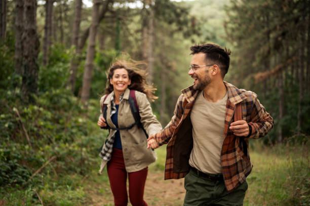 istock Beautiful young couple exploring nature 2198601548
