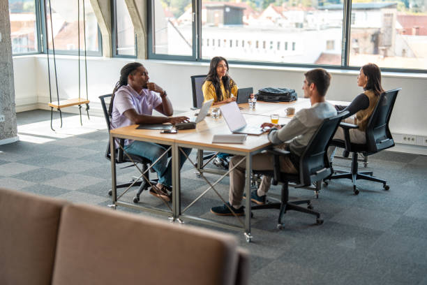 istock Diverse Team of Entrepreneurs in a Coworking Space 2198601975