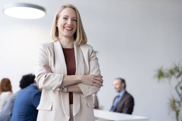 istock Charming Businesswoman Posing Thoughtfully with a Smile 2198603045
