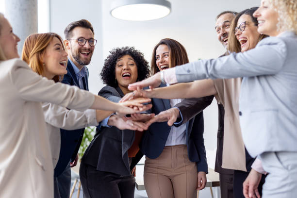istock Team celebrating success together in a collaborative moment 2198603048