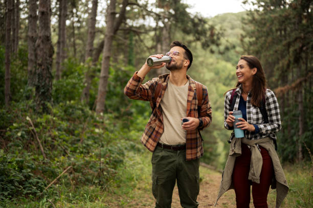 istock Beautiful young couple exploring nature 2198603307