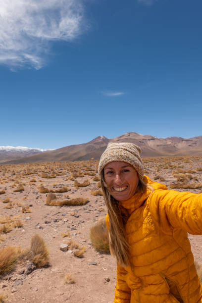 istock Woman Taking Selfie in Arid Desert Landscape 2198604807