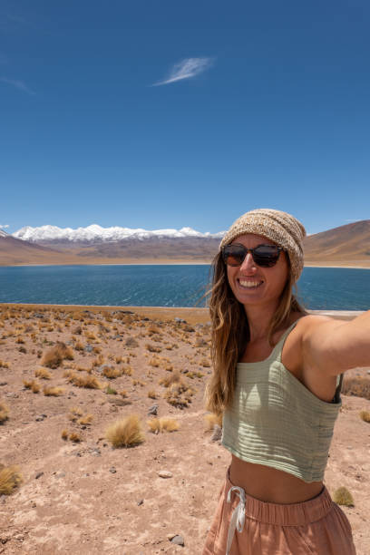 istock Woman Taking a Selfie in Scenic Desert Landscape 2198604884
