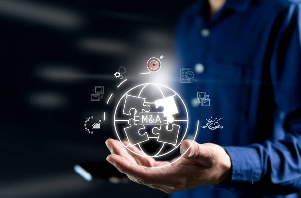 istock Mergers and acquisitions for better business development and potential, marketing growth, business expansion for competitive opportunities and increased bargaining power in the global market. 2198610471