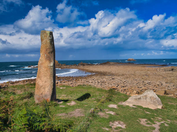 The rugged Britanny coast around Le Diben and Plougasnou in Northern France. Taken on a sunny day in late summer with a blue sky and light clouds from the coast path.