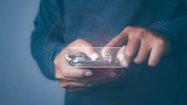 istock CONTACT US, Businessman using mobile smartphone support hotline people connect with contact icons ( email, address, live chat, internet wifi ). Customer service call center concept. copy space. 2198615611