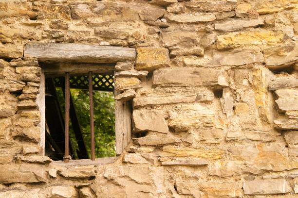 istock The iron window resists on its stone wall 2198616469