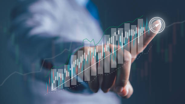 istock Businessman using laptop with forex trading graph financial data. Goal business success strategy chart target and planning. Stock market, financial graph growth report, business development. 2198616574