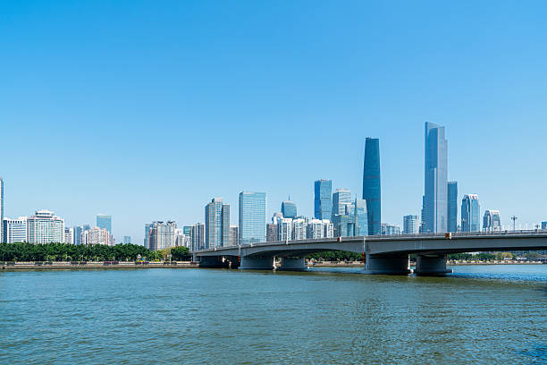 istock Modern Urban Skyline with River View and Bridge 2198617092