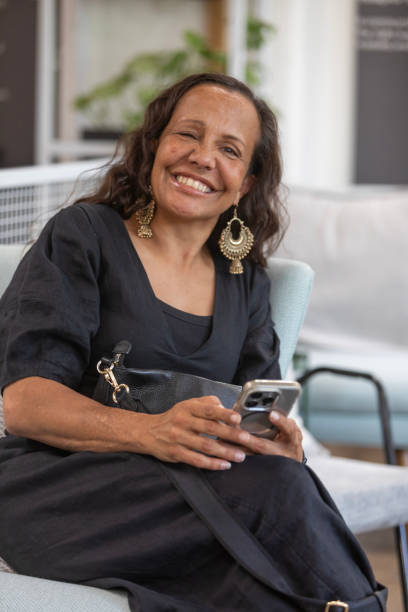 istock Mature Australian Aboriginal woman using her phone 2198619723