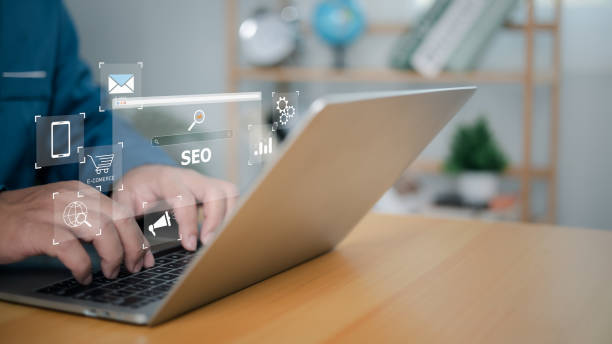 istock SEO Concept search engine optimization, Businessman using computer to show SEO on website for search engine ranking or SEO, AI Assistant search on screen, Marketing information technology. 2198620480