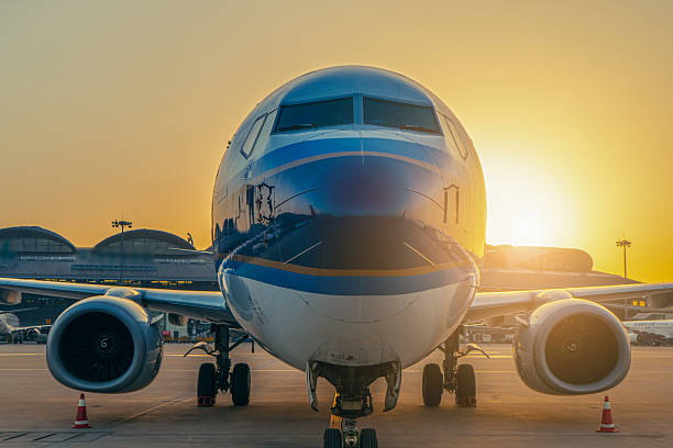 istock Captivating Sunset Over Airplane: A Journey Awaits 2198621172