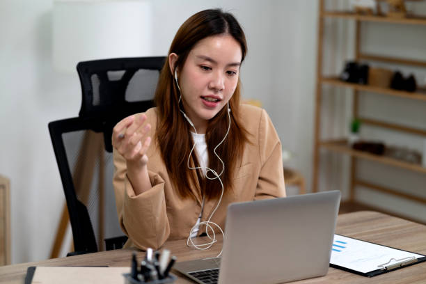 istock Female executives are speaking explaining and listening to suggestions 2198622982