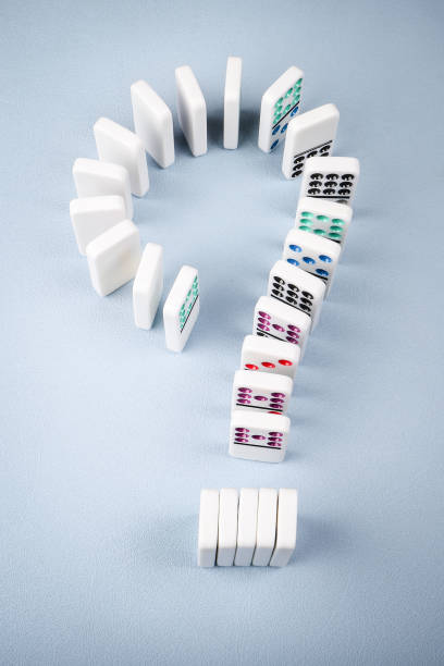 istock Dominoes arranged in the shape of a question mark 2198623822