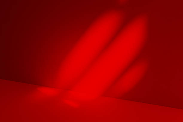 istock Wall interior background, studio and backdrops show products.with shadow from window color red . background for text insertion and presentation product 2198623885