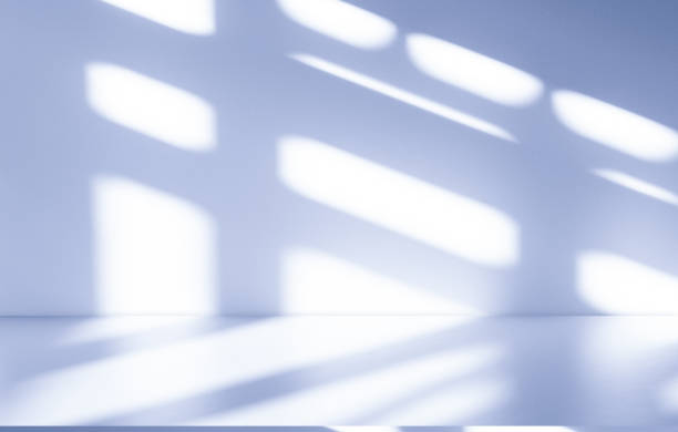 istock Studio style background wall decoration presentation uses white and blue tones. with shadows cast from a nearby window, concept creating a decorative 2198623902