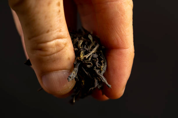 istock high-quality dry, not cooked green tea close-up 2198628116