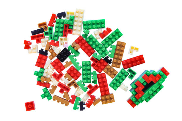 Pile of colorful plastic building blocks on white background with clipping path. plastic toy bricks