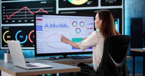 istock Female Caucasian Strategist Analyzing Real Time Business Data 2198632445