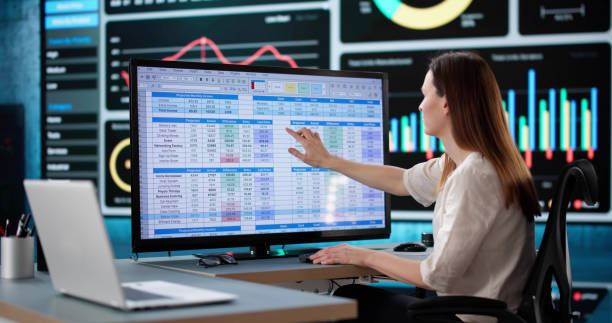 istock Woman Analyzing Medical Billing Data at Business Office 2198632448