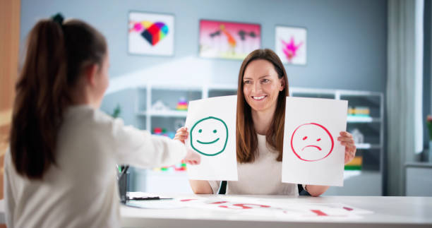 istock Helping a child with ADHD through therapy with a psychologist 2198632479