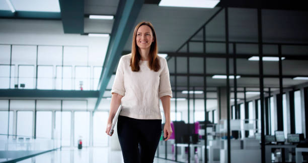 istock Creative Businesswoman Collaborating with Team 2198633719