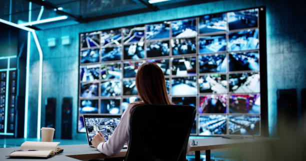 istock Woman Examining CCTV Camera Footage 2198633763
