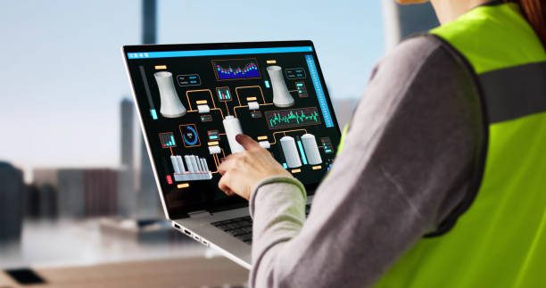 istock Female Operator Monitoring SCADA System 2198633917