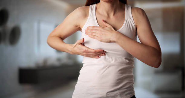 istock Nurse provides cancer screening and massage therapy 2198633976