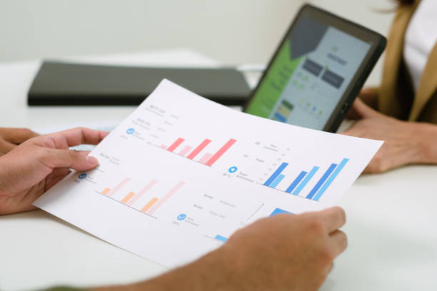 istock asian financial advisor presenting charts and data on a tablet during couple client meeting.financial planning and decision-making 2198634745