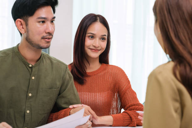 istock asian financial advisor presenting charts and data on a tablet during couple client meeting.financial planning and decision-making 2198634774