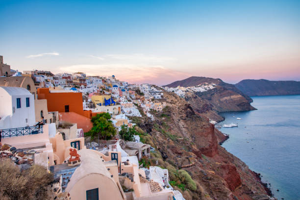 istock Breathtaking sunset over Oia, Santorini, with golden light illum 2198637012