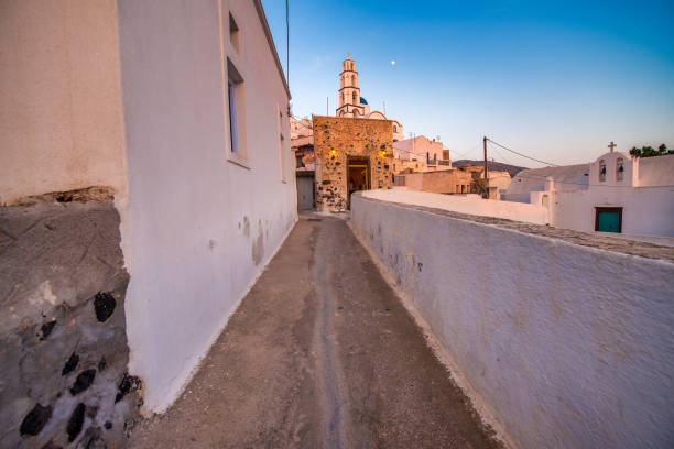 Stunning Cycladic architecture in Santorini, featuring narrow streets and breathtaking views.