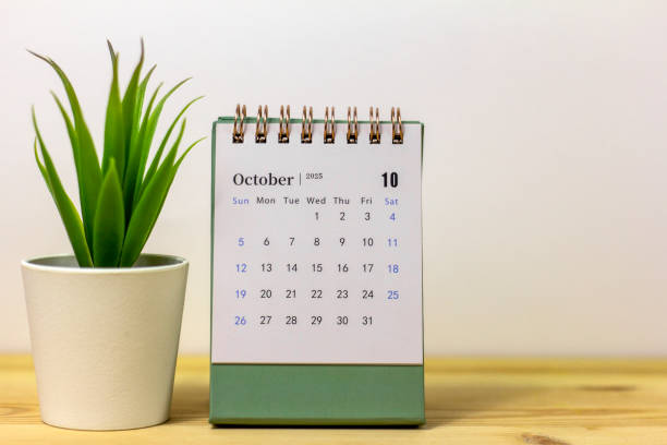 istock October 2025 calendar and clock on your desktop. 2198639782