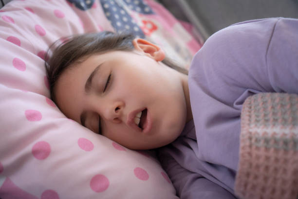 istock Deep sleeping children girl close up portrait 2198643659