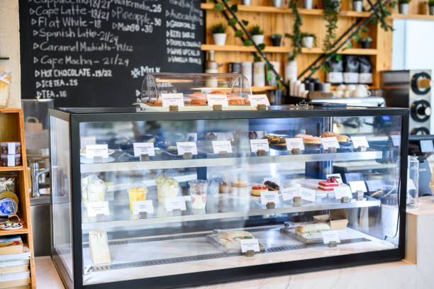 istock Refrigerated glass display with fresh pastries and fruit in cafe 2198643920