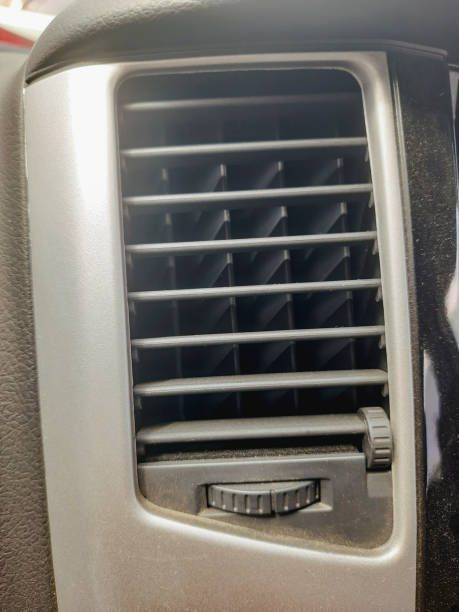 istock Close-Up of Car Air Vent with Adjustable Controls and Textured Panel Design 2198645094