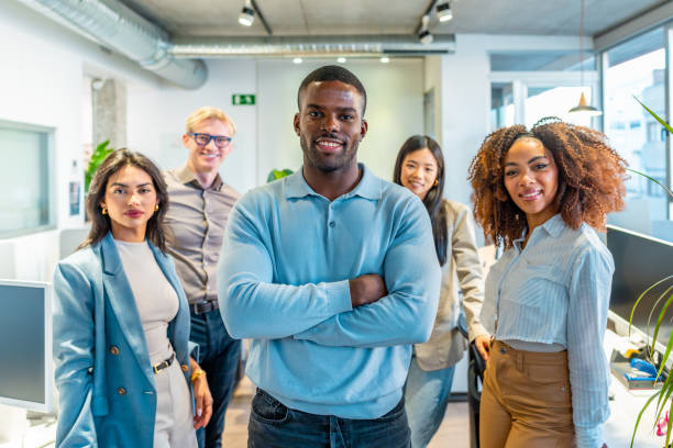 istock Confident business team smiling in coworking office space 2198646176