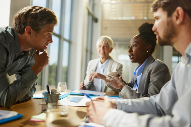 istock Business colleagues talking on a meeting in the office. 2198646422