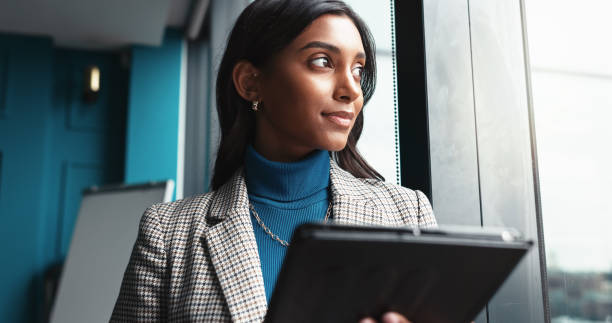 istock Thinking, tablet and idea with business woman in office for workshop coordinator, reflection and corporate trainer. Vision, planning and conference organizer with person in agency for schedule 2198649622