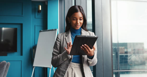 istock Research, tablet and planning with business woman in office for workshop coordinator, reading and corporate trainer. Feedback, typing and conference organizer with person in agency for schedule 2198649634