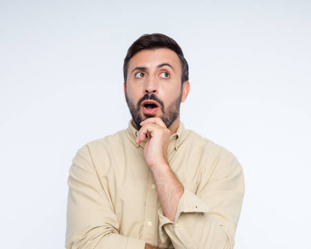 istock Headshot of surprised man 2198649644