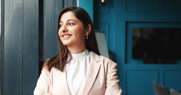 istock Window, business and woman in office, thinking and solution with problem solving. Happy person, lawyer and attorney in workplace, daydreaming and decision with choice, wonder and pride with new job 2198649677