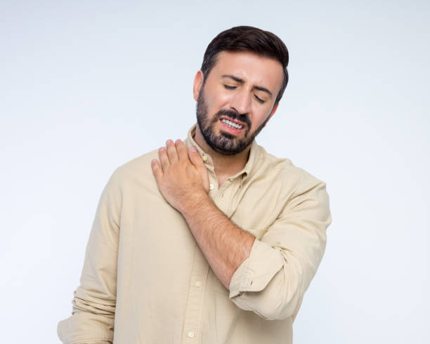 istock Portrait of man with shoulder pain 2198650042