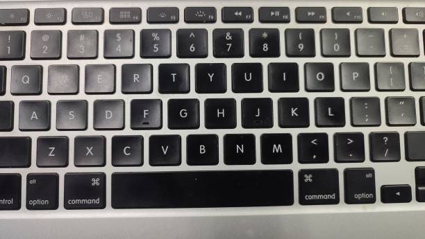 istock White Laptop Keyboard close up 2198650303