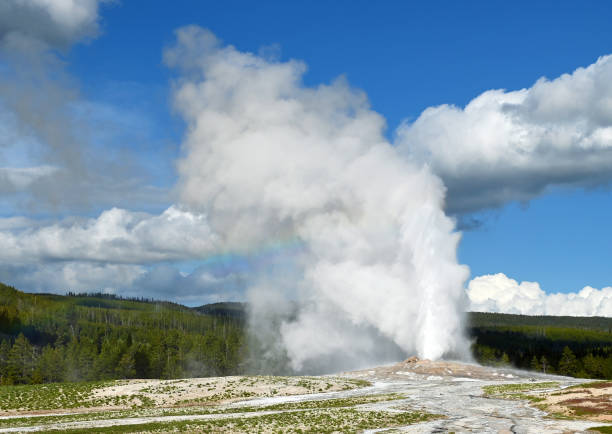 istock Old Faithful Geyser and Rainbow 2198656387