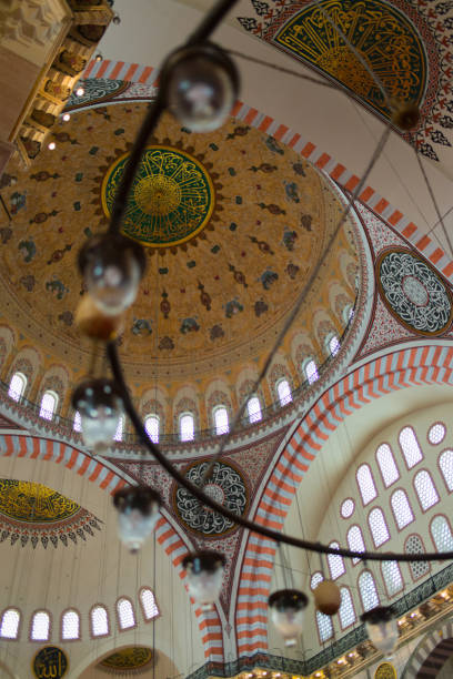 istock Beautiful interior at Suleiman mosque. Huge chandelier, low angle view 2198658459