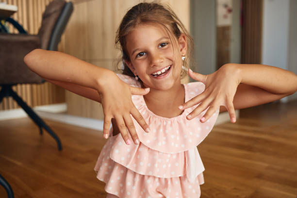 Beautiful girl taking care of her look stock photo