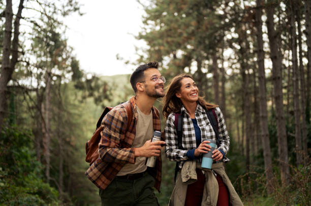 istock Beautiful young couple exploring nature 2198660673