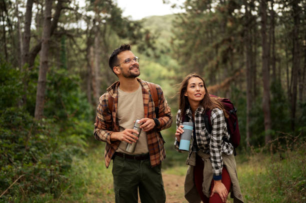 istock Beautiful young couple exploring nature 2198660677